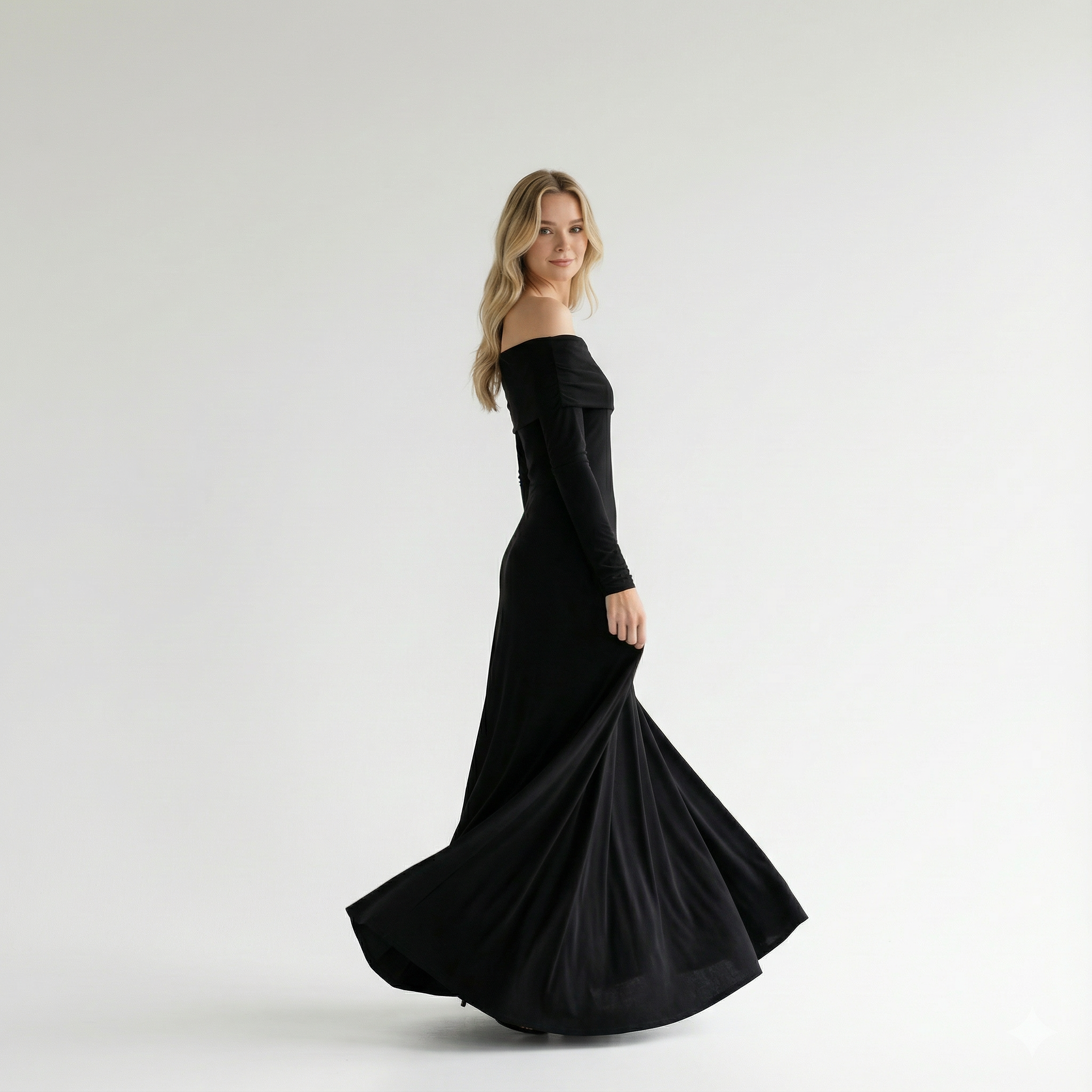 Woman wearing a black off-shoulder gown on a white background